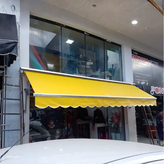 Toldo Cortina com Braços Laterais em São Paulo SP Toldo Cortina com Braços Laterais em São Paulo SP — Cobertura em quintal residencial coberto
